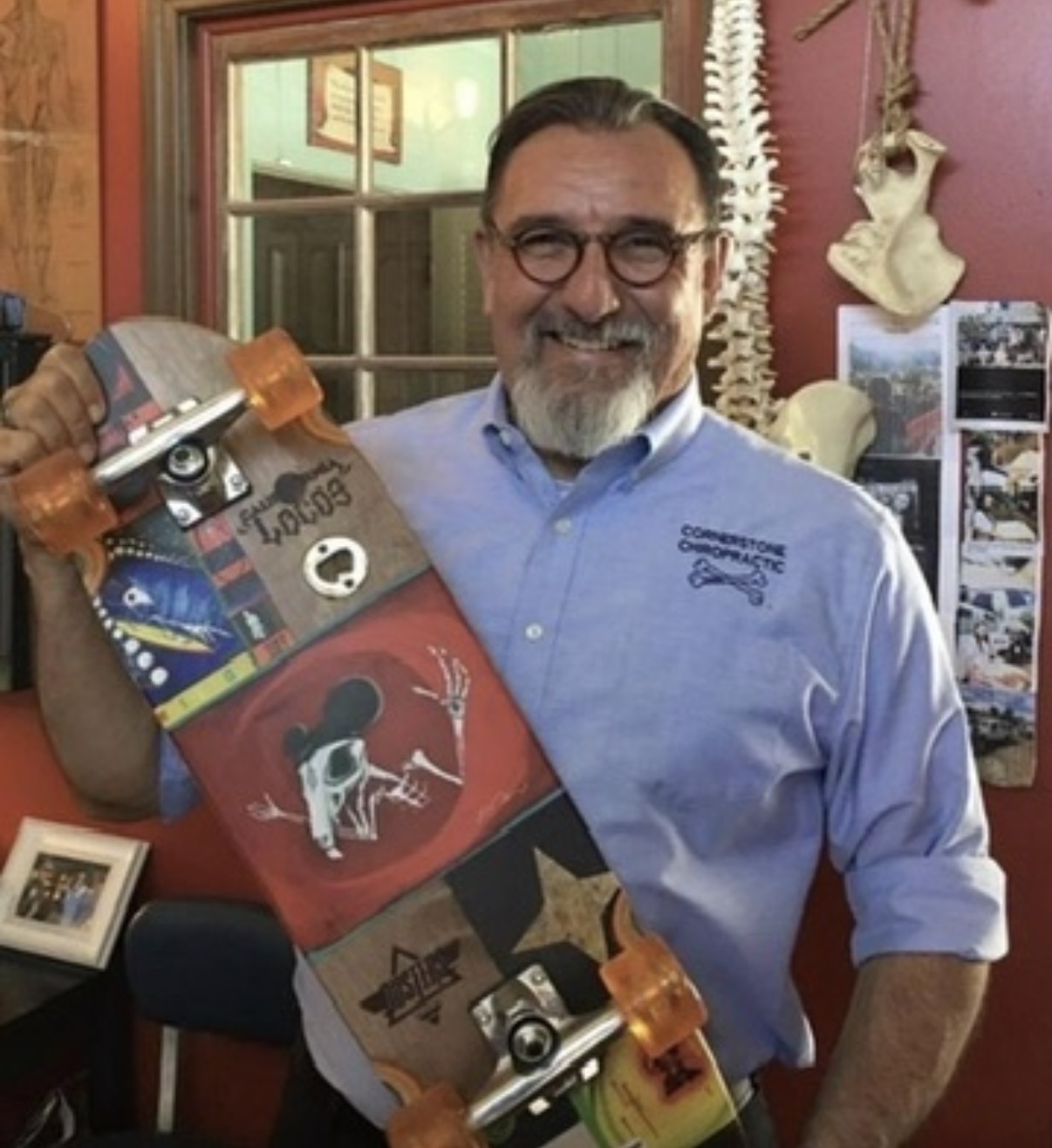 Dr. George with a skateboard